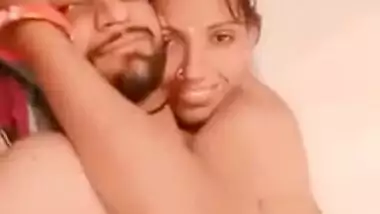 Man looks into the camera posing with sex Desi partner in XXX poses