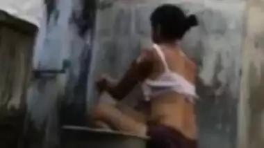 India girl bathing