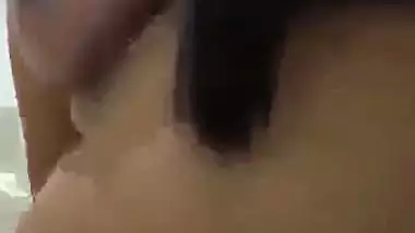 Tamil porn of a girl riding after putting a condom on a dick