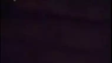 Young gal in red lingerie teases her XXX Desi pussy for the camera