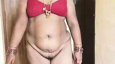 Tamil milf strips and gets naked before her Nephew