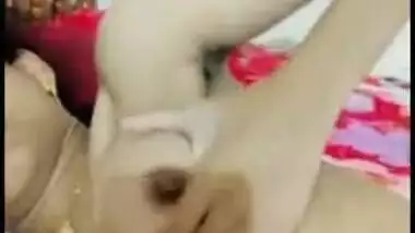 Desi girl exposes XXX boobies and pinches brown nipples holding camera