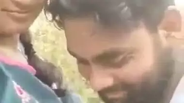 Indian outdoor sex of a guy sucking his GF’s tight boobs