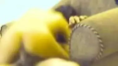 spreading legs to show her clean shaven pussy...