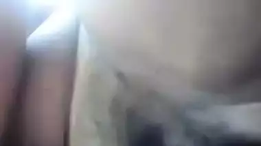 Big-tittied Desi hussy with huge breasts rubs her XXX pussy on cam