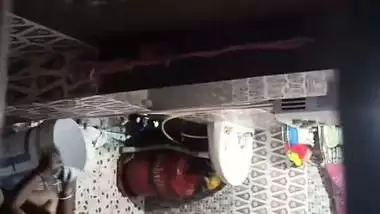 Neighbor aunty taking bath caught by voyeur