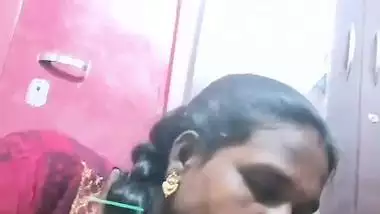 Mature tattooed Tamil wife giving handjob to husband