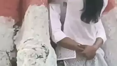 College couple enjoys outdoor sex below a big tree