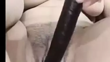 Beautiful girl with dildo masturbating her pussy