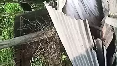 Village neighbor girl outdoor bath caught through hole