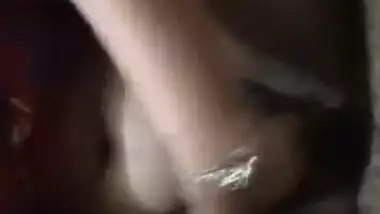 Slinky Desi slut takes her XXX coconuts out and licks sex nipple